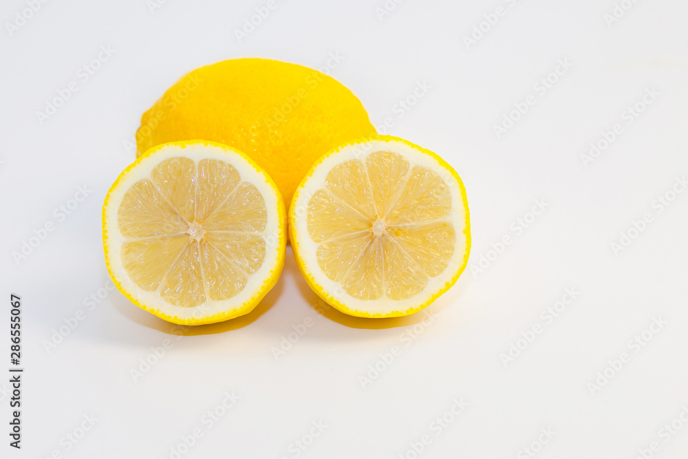 lemons and lemon slices on white background lemons and lemon slices on white background