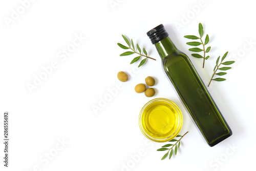 Fotótapéta olive oil in a bottle on a white background top view.