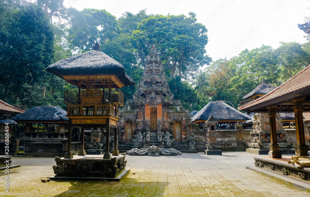 Temple in the monkey forest near Ubud. An ancient temple in the jungle, Bali, Indonesia.