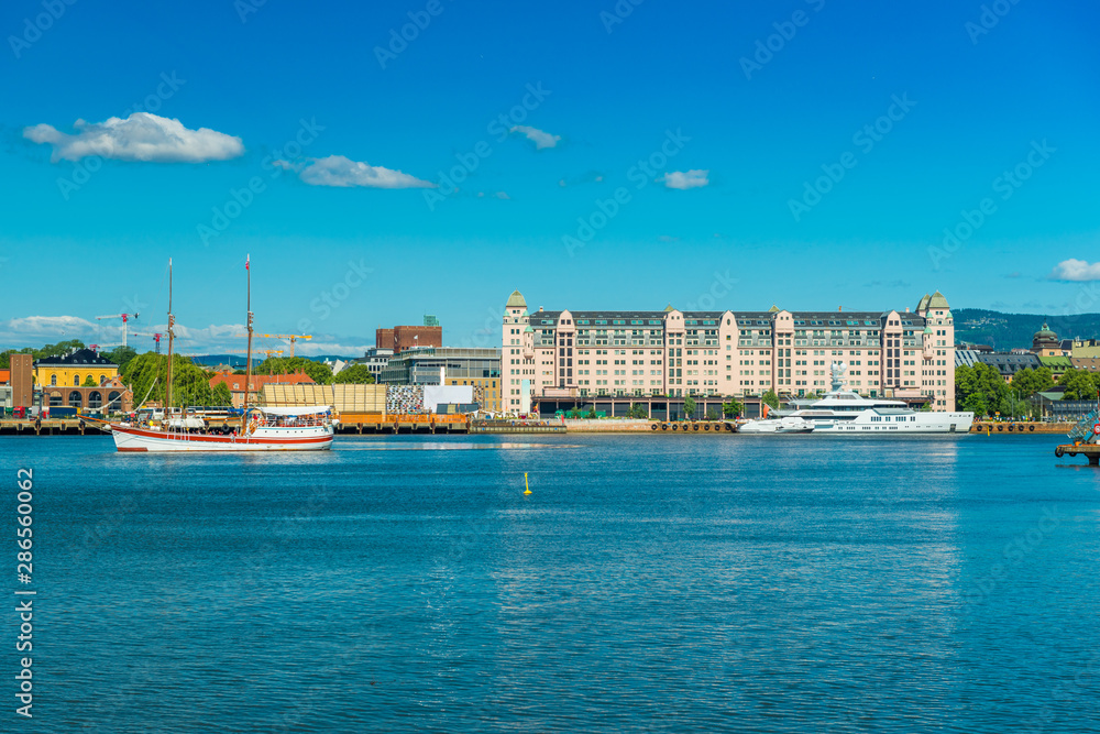 Cityscape of Oslo viewed from the sea, Norway. Skyline of a port city on summer sunny day