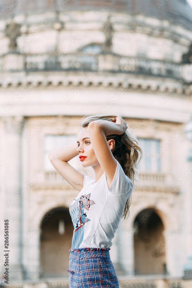 attractions significant places of Germany. beautiful smiling girl in Berlin. attractions significant places of Germany. beautiful smiling girl in Berlin.