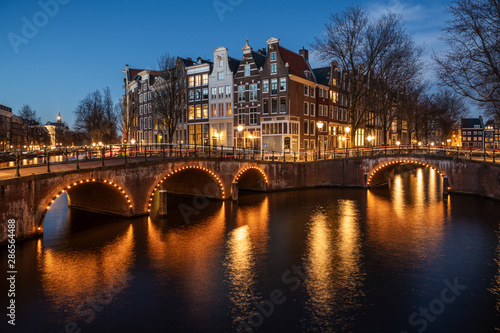Canal and old houses in Amsterdam, Netherlands.