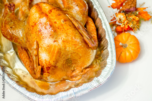 Overhead Angle of Roasted Turkey in a Foil Roasting Pan