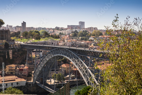View of the the Dom Luiz bridge, historic city of Porto, Portugal © mikhailberkut