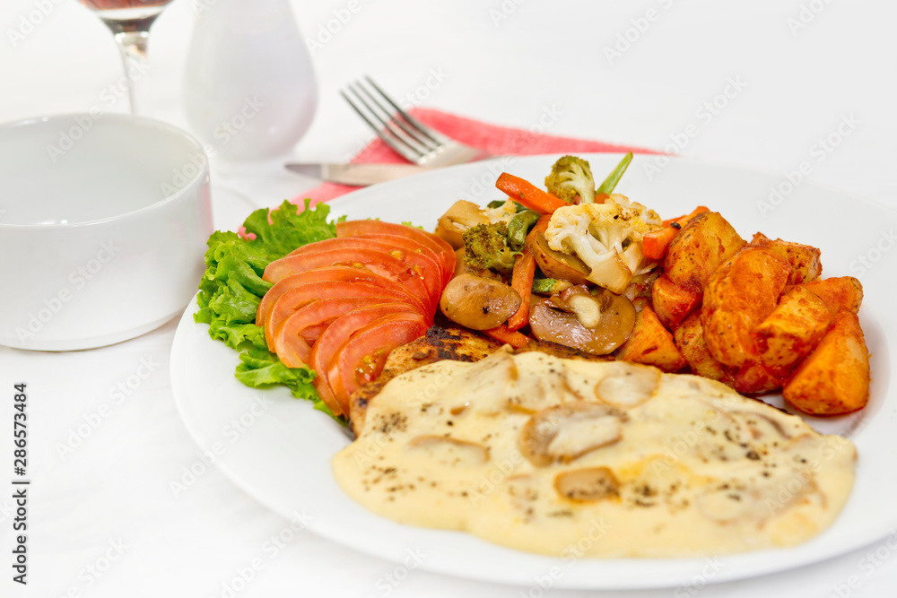 Peri peri Chicken with Button mushroom gravy, Saute Vegetables, Spicy fried Potatoes with Tomato Lettuce Salad. Peri peri Chicken with Button mushroom gravy, Saute Vegetables, Spicy fried Potatoes with Tomato Lettuce Salad.