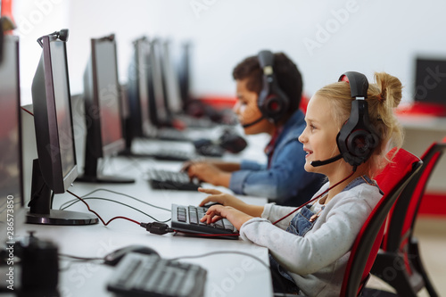 Mixed Racial group Of Elementary School Children In Computer Class