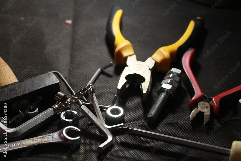 Fototapeta premium construction tools on a black background