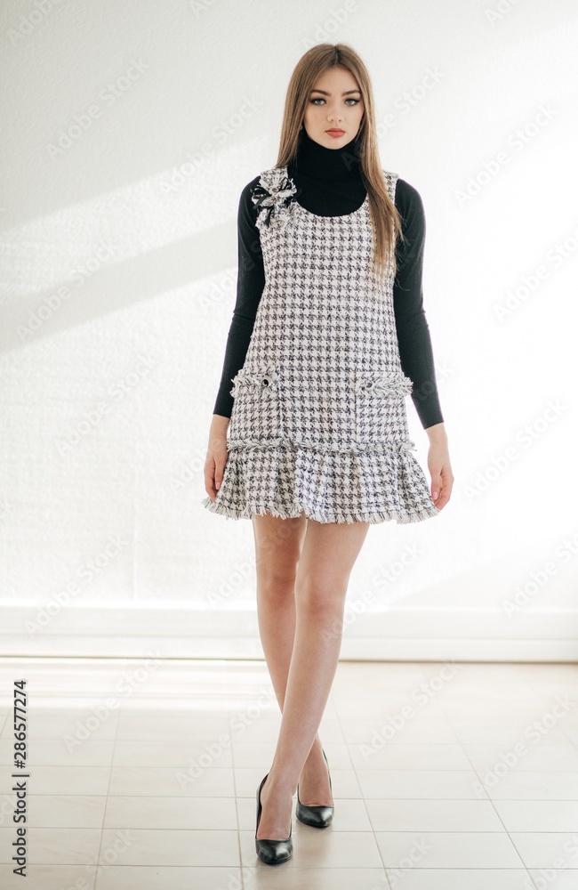 Portrait of beautiful girl with makeup in fashion clothes Portrait of beautiful girl with makeup in fashion clothes