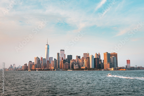 New York City New Jersey, NYC/ USA - 08 21 2017: Amazing sunset on New York City Hudson River on public transport staten island ferry with beautiful panorama view to NYC Manhattan skyline