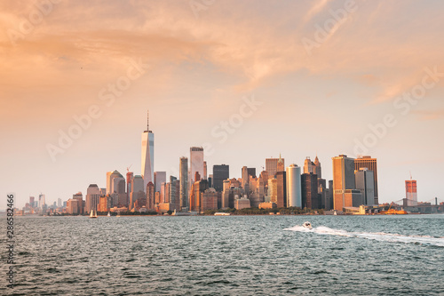 New York City New Jersey  NYC  USA - 08 21 2017  Amazing sunset on New York City Hudson River on public transport staten island ferry with beautiful panorama view to NYC Manhattan skyline