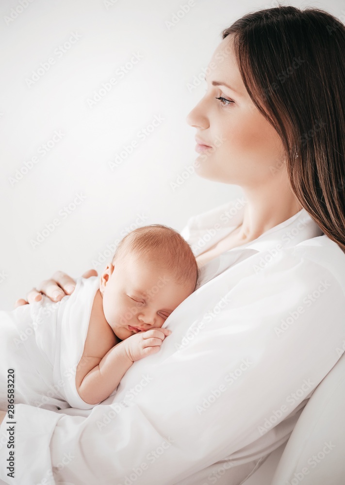 Young happy mother with baby girl Young happy mother with baby girl