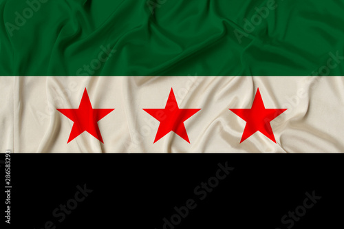 Obraz na plátně beautiful photograph of the national flag of the Syrian opposition on delicate s