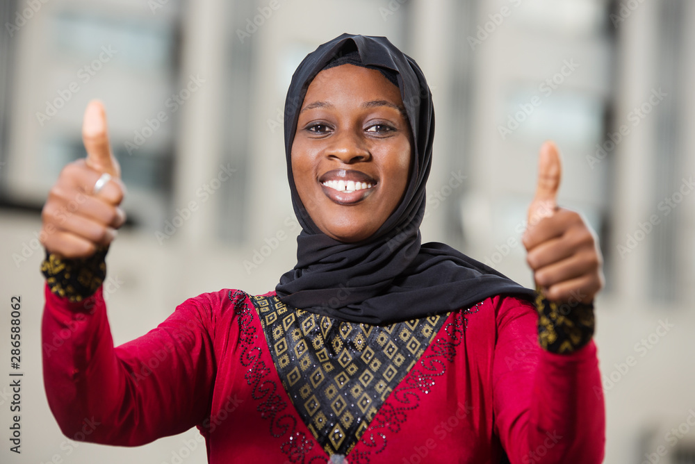 close up of young muslim woman, happy. close up of young muslim woman, happy.