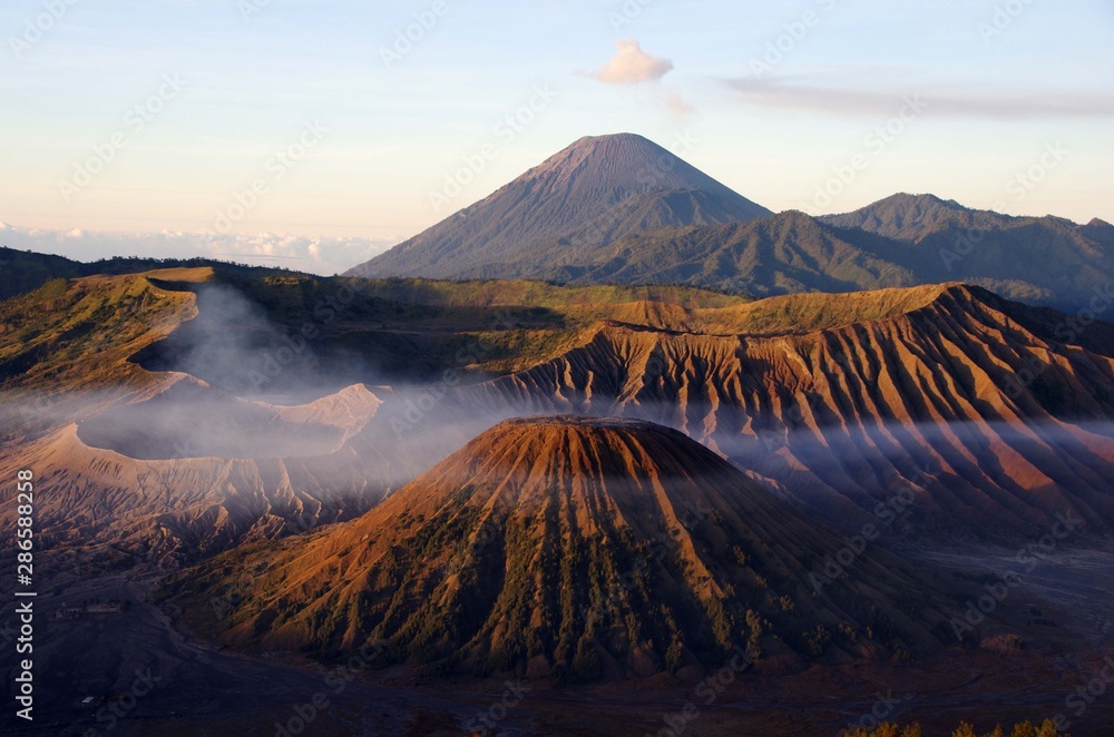 The Bromo volcano and the Tengger caldera at dawn on the Java island in Indonesia The Bromo volcano and the Tengger caldera at dawn on the Java island in Indonesia