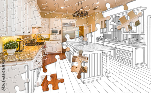 Puzzle Pieces Fitting Together Revealing Finished Kitchen Build Over Drawing photo