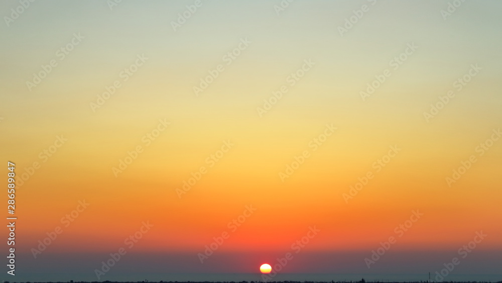 bright sunset in the sea background