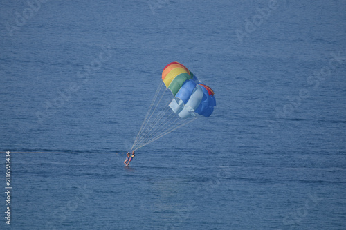 Parasailing over the sea in corfu photo