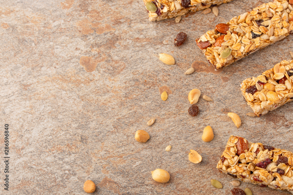 granola bars with nuts with space for design, horizontal photo, diet, proper nutrition granola bars with nuts with space for design, horizontal photo, diet, proper nutrition