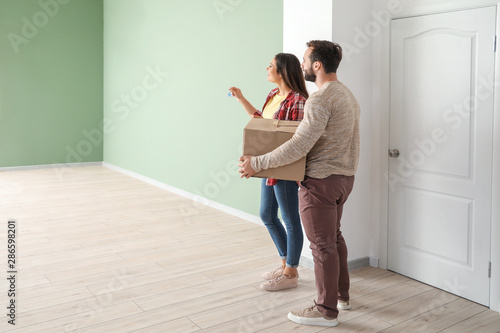 Happy young couple in their...