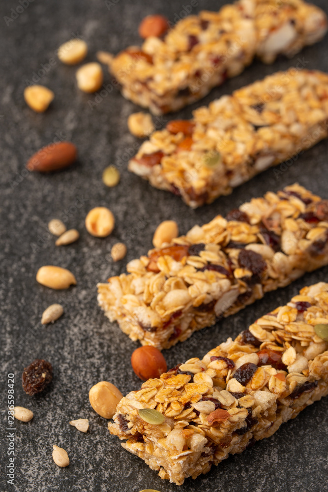 granola bars with nuts and, vertical photo, diet, proper nutrition granola bars with nuts and, vertical photo, diet, proper nutrition