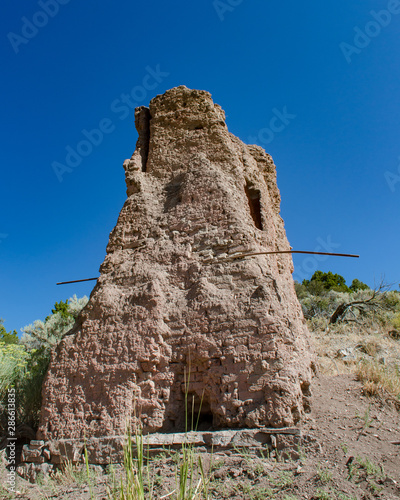 USA  Nevada  White Pine County  White Pine Range  Hamilton Mining District  Shermantown. The ruins of a crumbling smelter stack tower from this Treasue Hill mine site and ghost town.