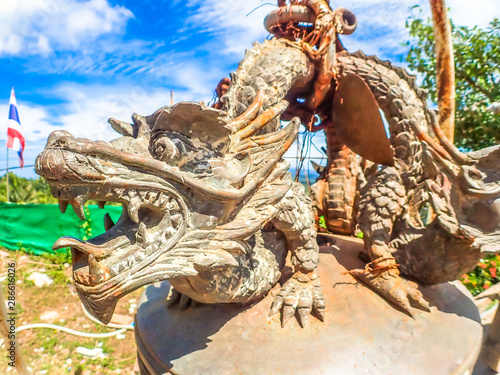 Metal dragon viewed from Big Buddha Phuket a popular tourist destination in Phuket Island Thailand Asia © Jeffery
