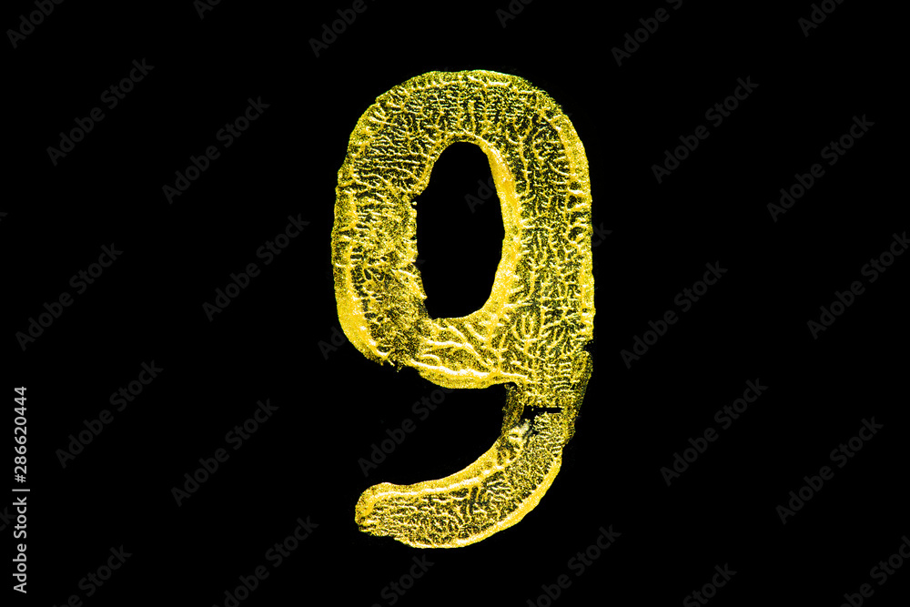 Golden number 9 isolated on black background Golden number 9 isolated on black background