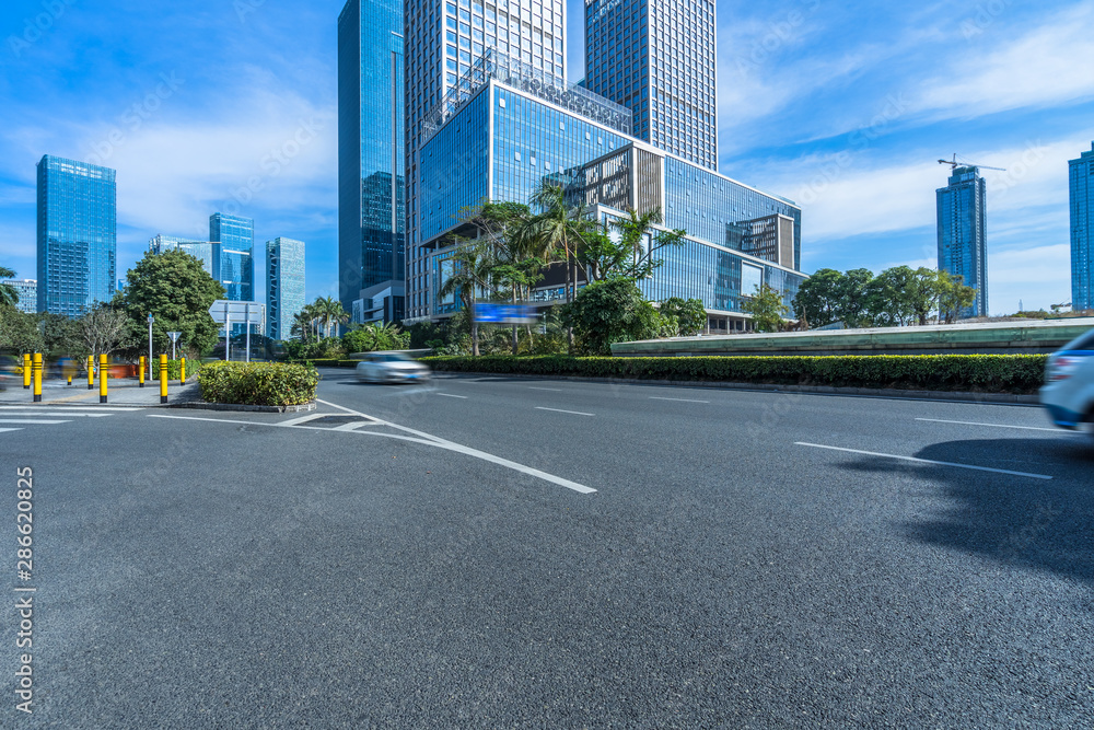 empty urban road with modern building in the city.