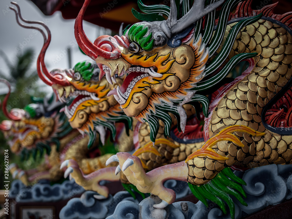 Tha Rua Shrine one most prominent Taoist shrines on Phuket Island, with its colorful and ornate dragon motif decor. 