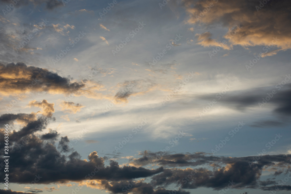 Obraz premium Landscape. Sunlit cloudy sky. Sunset