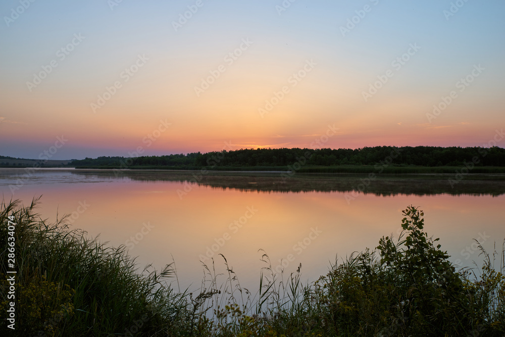 Beautiful morning landscape of shores of lake