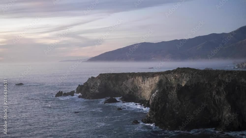 Day to Night Time-lapse of California Coastline followed by Stars and Milky Way Appearing in the Night Sky in 4k Day to Night Time-lapse of California Coastline followed by Stars and Milky Way Appearing in the Night Sky in 4k