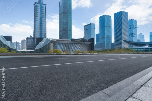 empty urban road with modern building in the city.