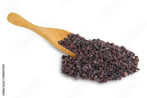 Himalayan black volcanic rock salt in wooden spoon isolated on white background. This has clipping path.  