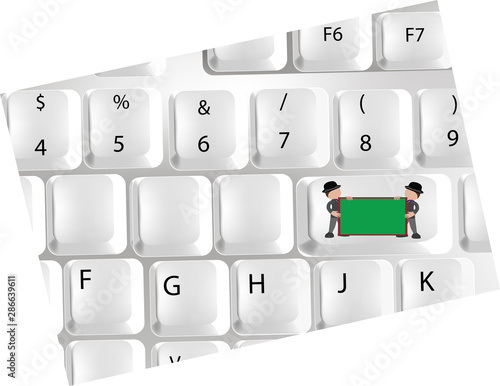 persone sorreggono un cartello di protesta sulla tastiera del computer 