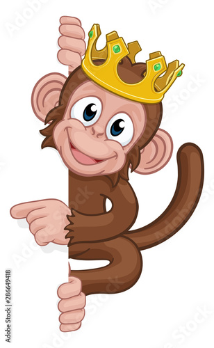 A king monkey cartoon character animal wearing a crown behind a sign peeking around and pointing at it