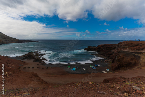 Beautiful rigid volcanic beaches in El Golfo on Lanzarote island, Canary Islands, Spain. 