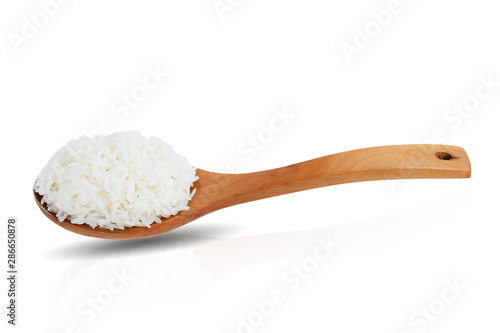 Jasmine rice on wooden ladle isolated on white background. This has clipping path. 
