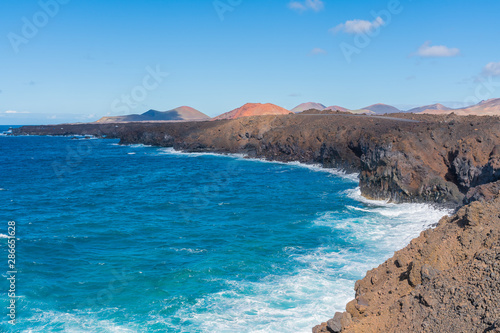 Beautiful rigid volcanic beaches in El Golfo on Lanzarote island, Canary Islands, Spain. 