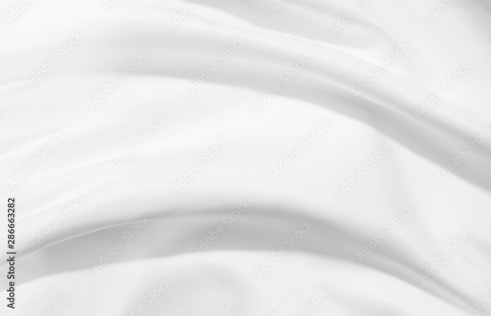 Soft focus white silk fabric texture background Soft focus white silk fabric texture background