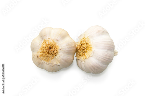Raw garlic heads isolated on white background close-up