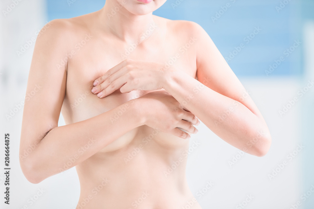 Naklejka premium Breast cancer self check concept