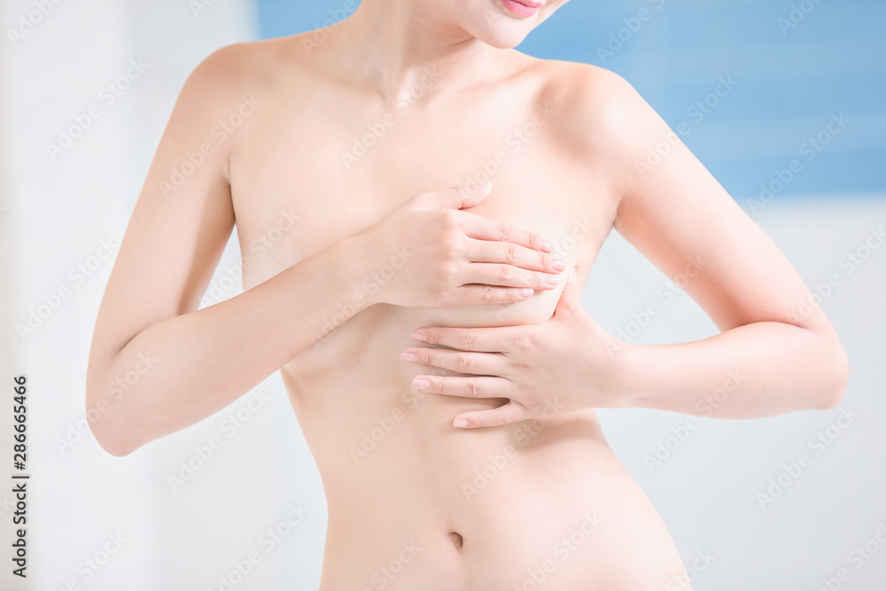 Fototapeta premium Breast cancer self check concept