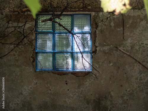 00Soviet style glass brick windows in Zalissya village in Chernobyl Exclusion Zone, Ukraine photo