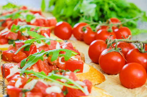 bruschetta with cheese and tomato. Close-up