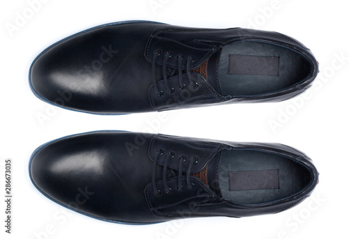 Classic male leather shoes isolated on a white  top view.