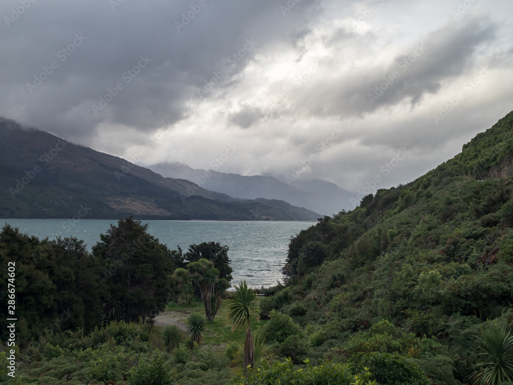 View of Lake Wanaka and clouds over the mountains, New Zealand