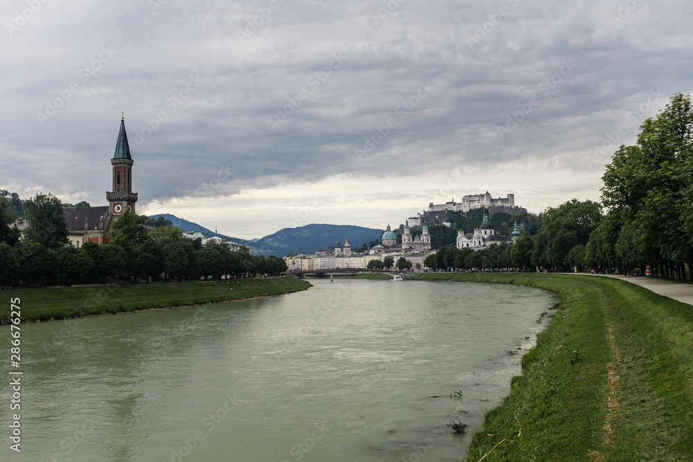 The Salzburg skyline with Hohensalzburg Fortress and Salzach river in summer, Austria