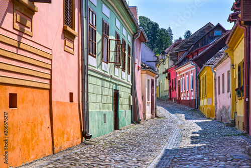 Colorful street in the medieval Sighisoara © savcoco