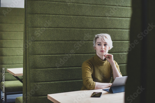 Freelance businesswoman working in a cafe photo